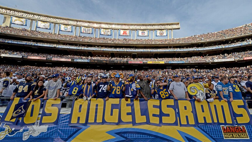 St Louis fans display a Los Angeles Rams banner