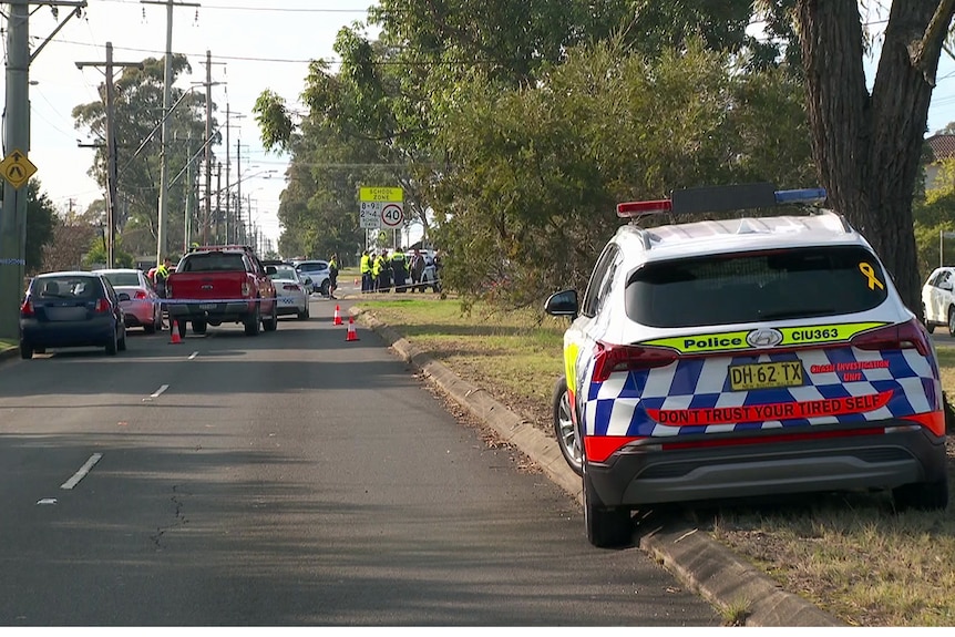 NSW Police and emergency services attend the scene of an alleged road rage incident at Blackett