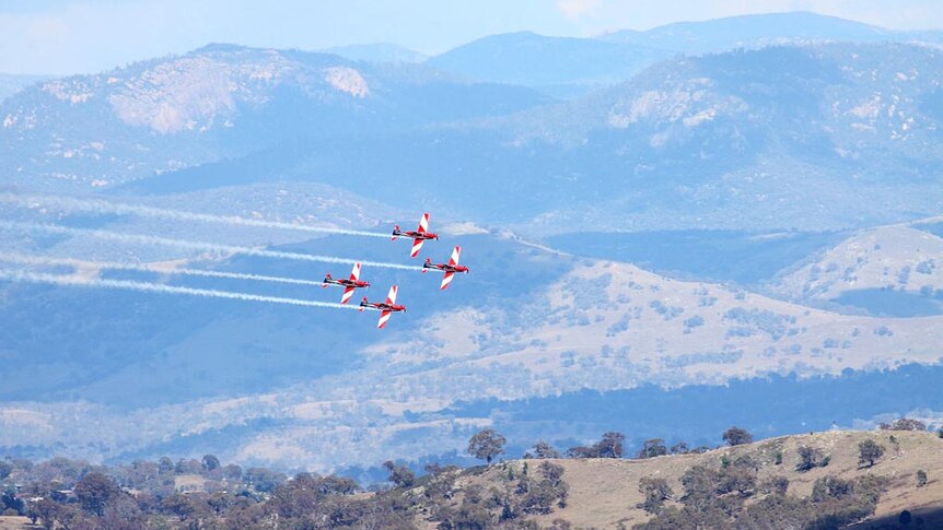 The RAAF Roulettes perform over Canberra.
