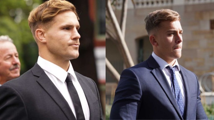 Two young men in suits outside a court