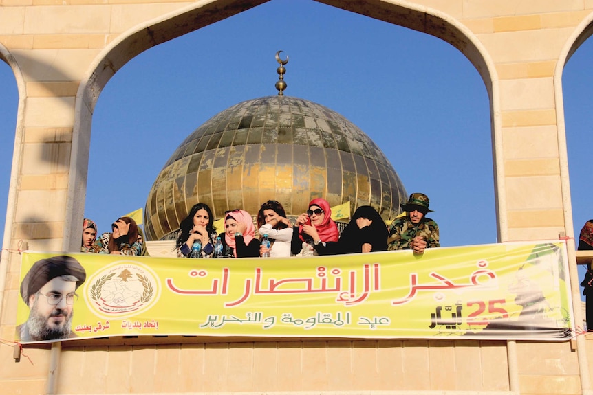 Women watch Nasrallah's speech