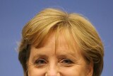 Angela Merkel: 'Tear down the walls of today'