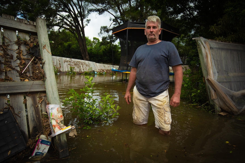 Man stands in knee deep water