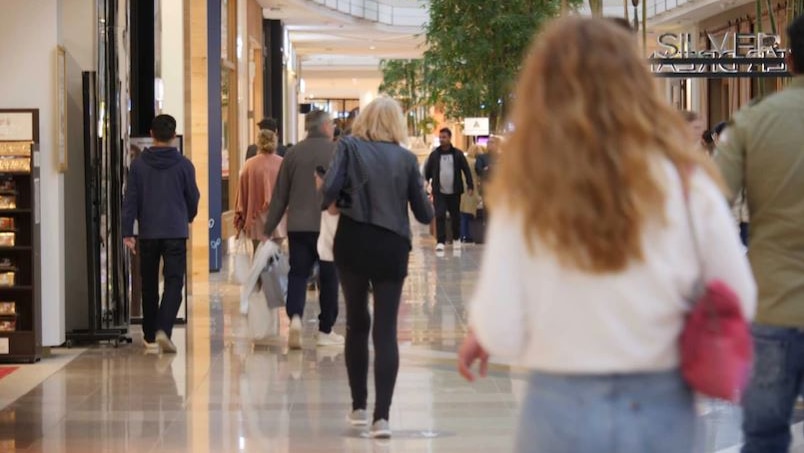 People walk through the Chadstone Shopping Centre