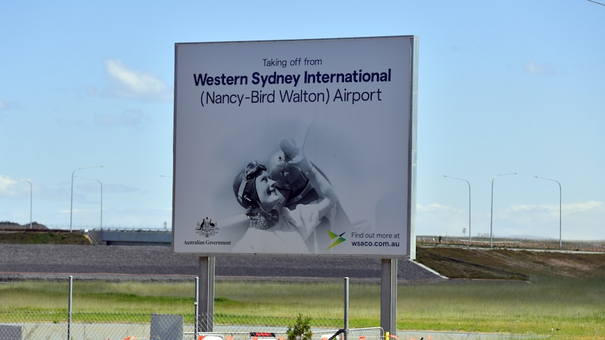 a billboard on grass