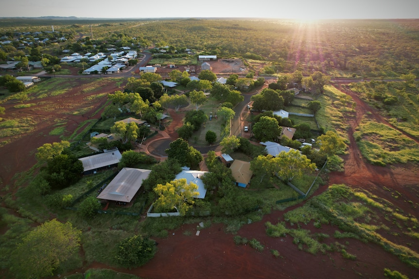 An aerial shot of a rural housing sub-division at sunset