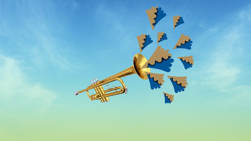 A trumpet floating in a blue sky.