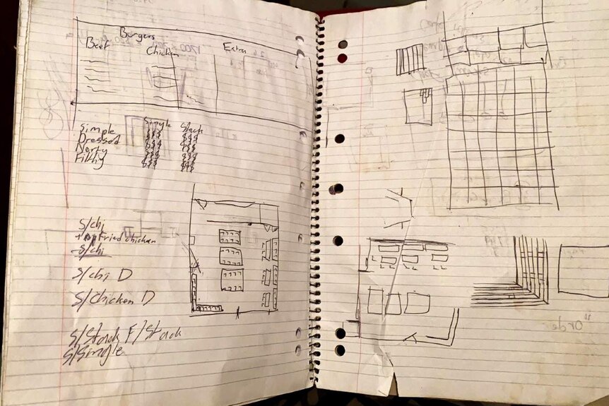 Draft menus and rough floor plans are scribbled inside an old notebook.