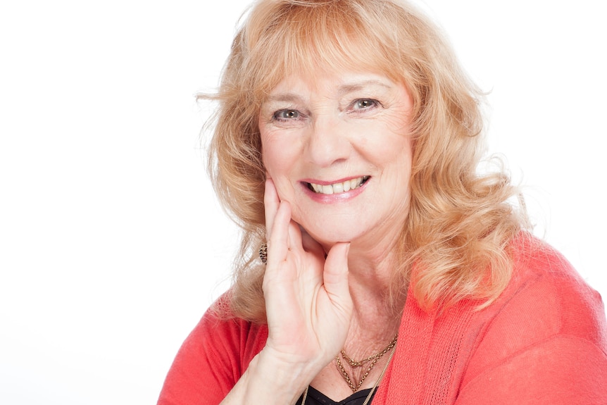 A head shot of a middle-aged woman