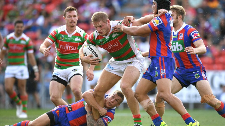 George Burgess gets wrestled to the ground