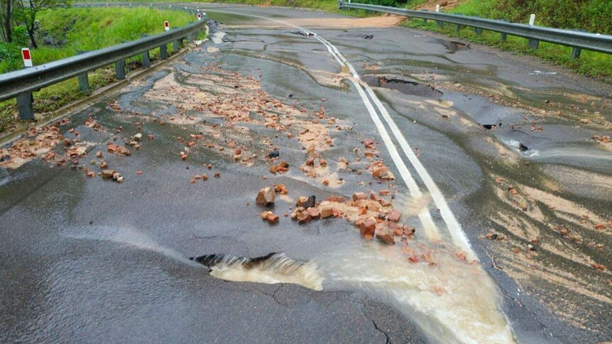 A damaged and broken road.