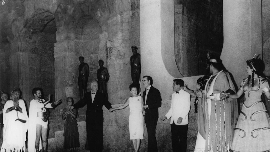 Actors with composer Peggy Glanville-Hicks at the curtain call of the premiere of the opera "Nausicaa."