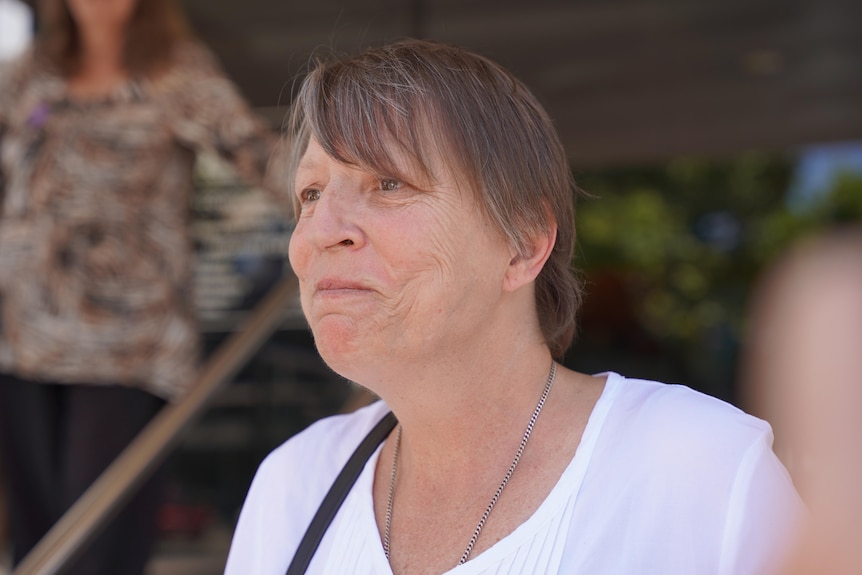 A woman with a white shirt