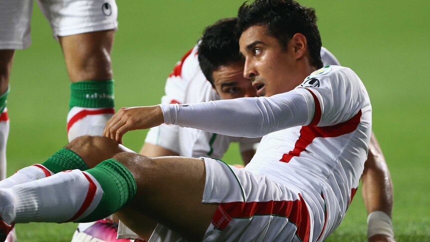 Iran celebrates goal against South Korea