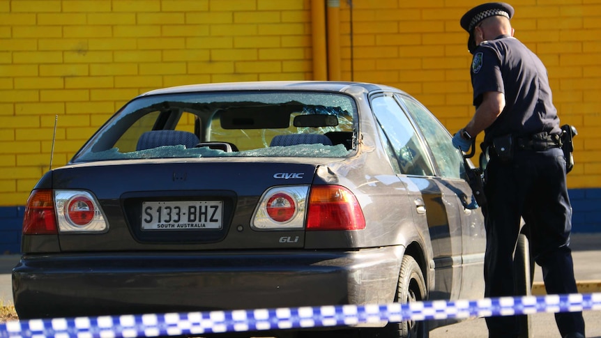 Police investigate the circumstances where one man stabbed and a second hit by car at Prospect on January 15, 2014.