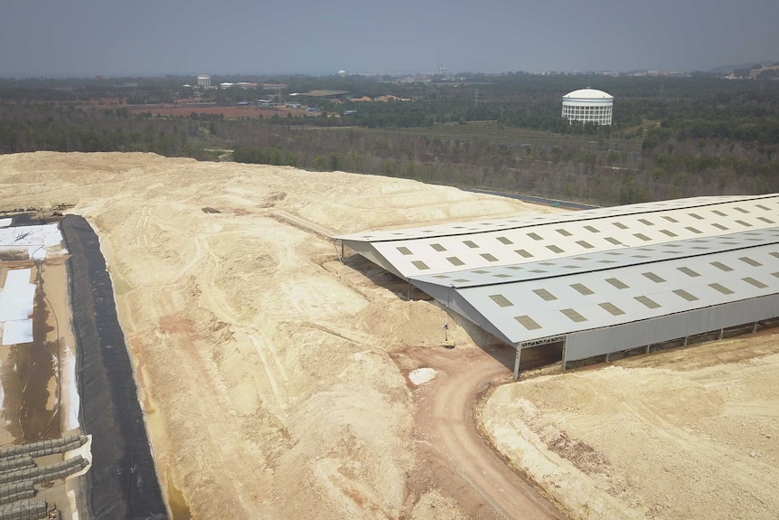 A drone shot of a huge pile of dirt at a rare earths facility in Malaysia