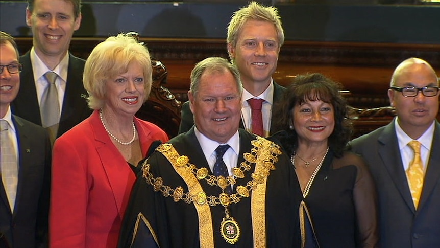 Robert Doyle as mayor surrounded by other members of council.