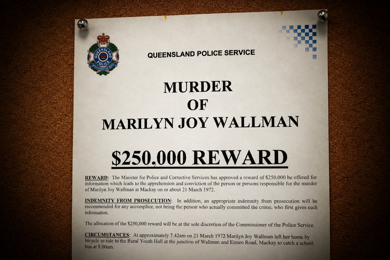 A poster on a cork noticeboard offering a reward for information.