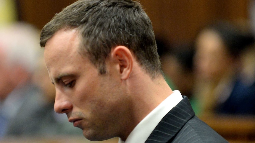 Oscar Pistorius listens to details of Reeva Steenkamp's autopsy
