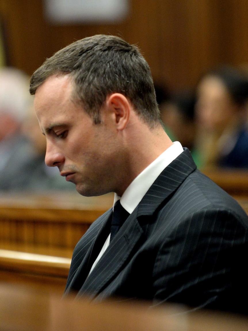 Oscar Pistorius listens to details of Reeva Steenkamp's autopsy