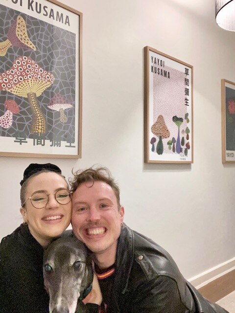 Patrick and his partner Eilish pose for a selife with their greyhound, Basil.