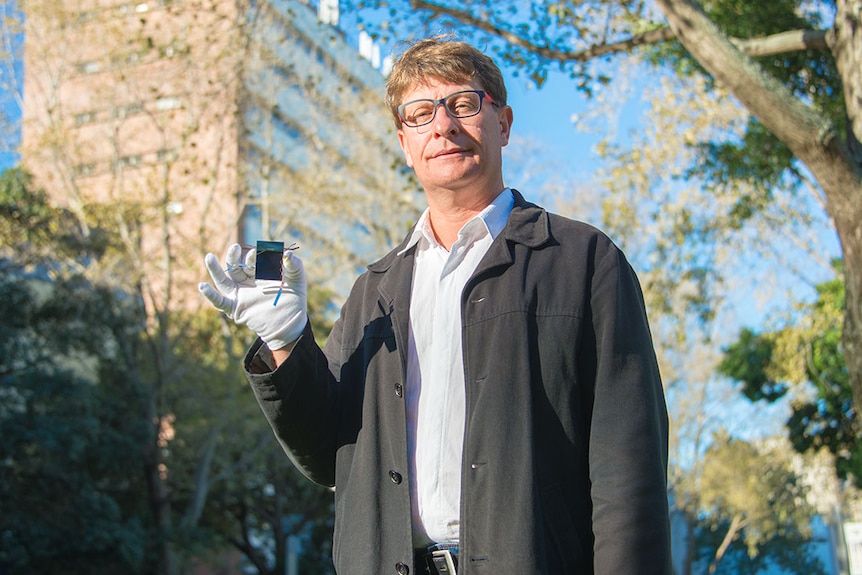 Mark Keevers with solar cell