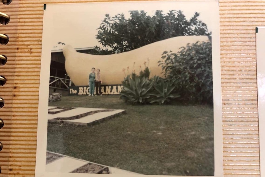 Two people pose in front of the Big Banana at Coffs Harbour in NSW in a 1972 photo.