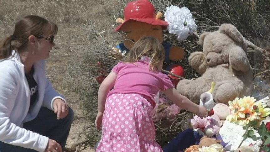 Family leaves flowers at Wynarka shrine for Khandalyce Kiara Pearce