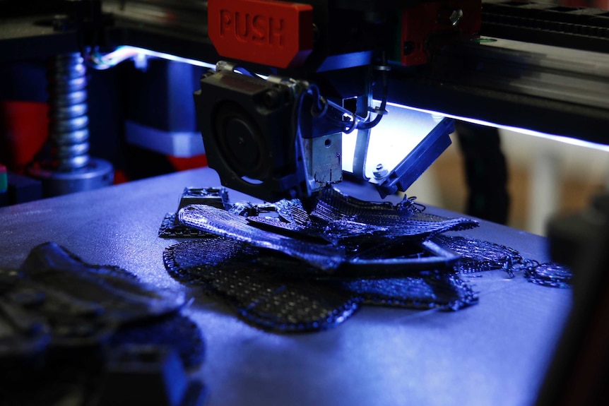 A rubber butterfly being printed.