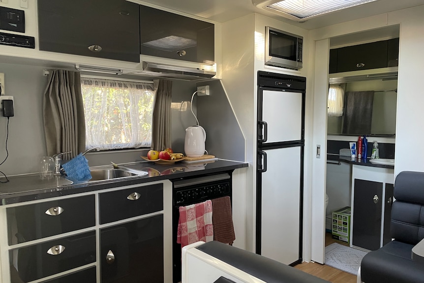 view of kitchenette with ensuite room in the background