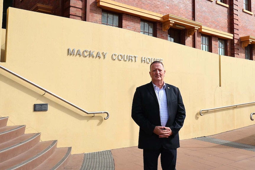 Adam Le Fevre stands in front of the Mackay court house.