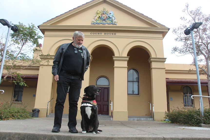 Ivan and his dog Lucy outside the Taree court.