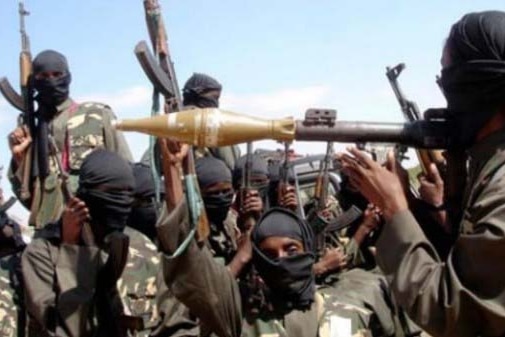 Boko Haram, including fighter holding missile launcher, on a raid in Nigeria