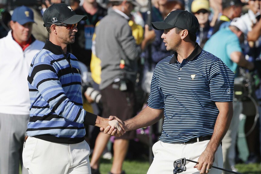 Jason Day and Adam Scott shake hands at the Presidents Cup