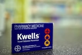 A packet of Kwells travel sickness tablets containing hyoscine.