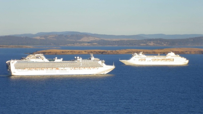 LtoR Diamond Princess and Pacific Pearl cross paths on the River Derwent.