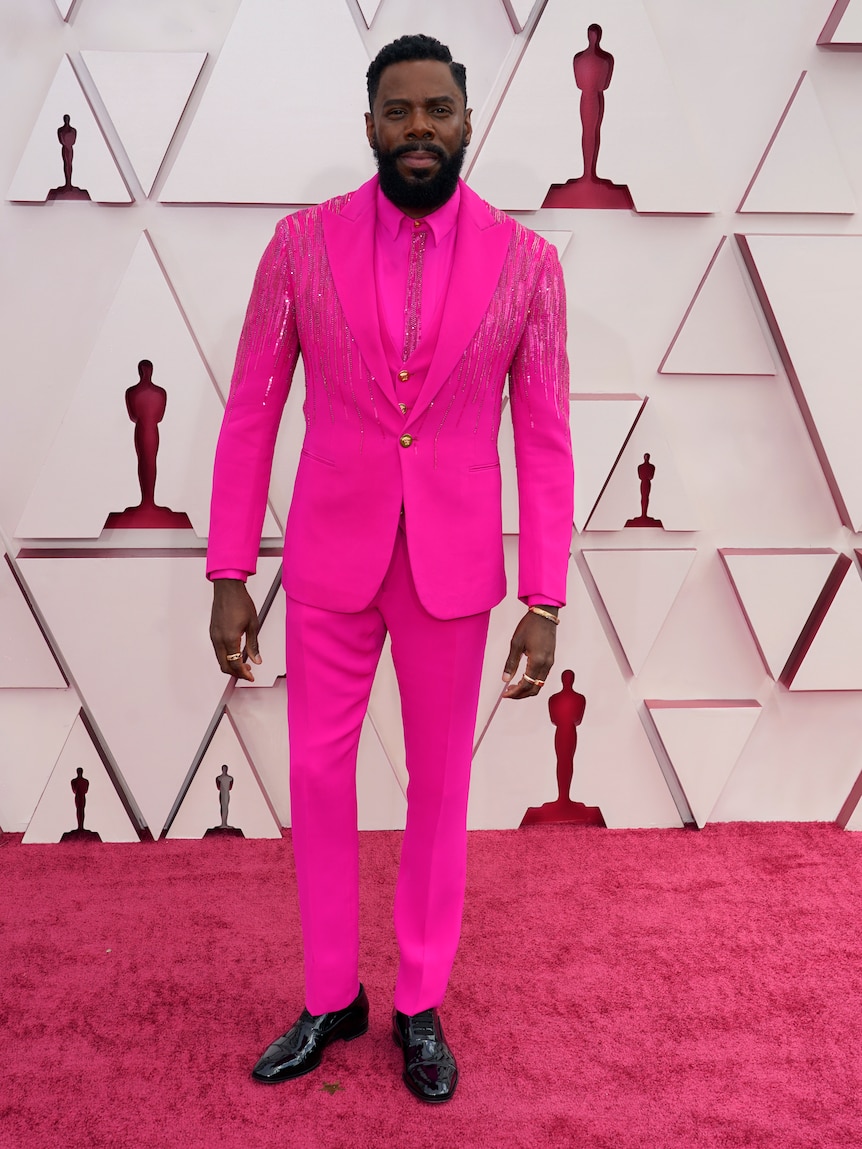 Colman Domingo in bright pink suit on Oscars red carpet