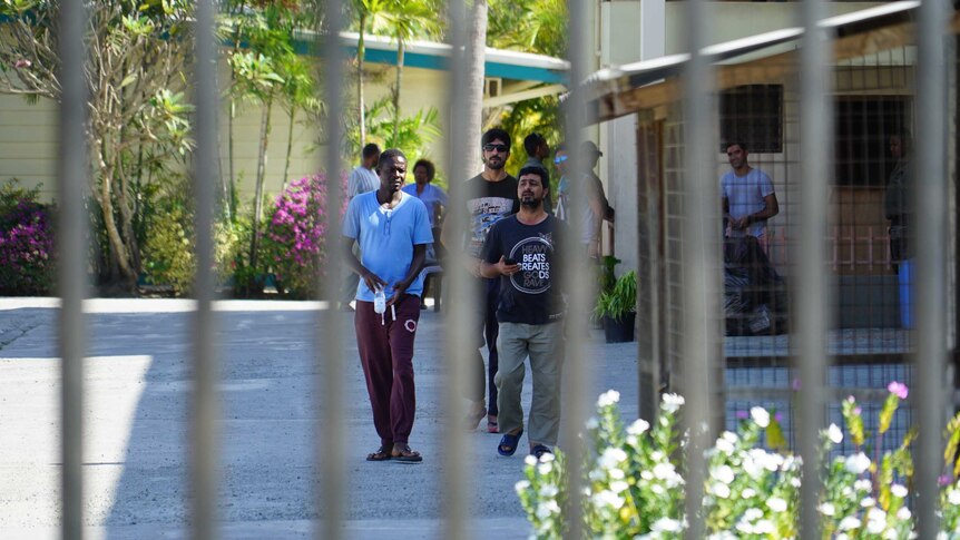 Asylum seekers and refugees inside the grounds of the Port Moresby Motel.