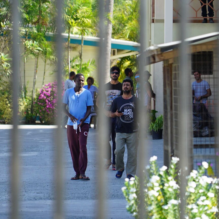 Asylum seekers and refugees inside the grounds of the Port Moresby Motel.