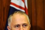 Mr Turnbull says the PM has used the 'R' word to deflect attention from the asylum boat disaster.