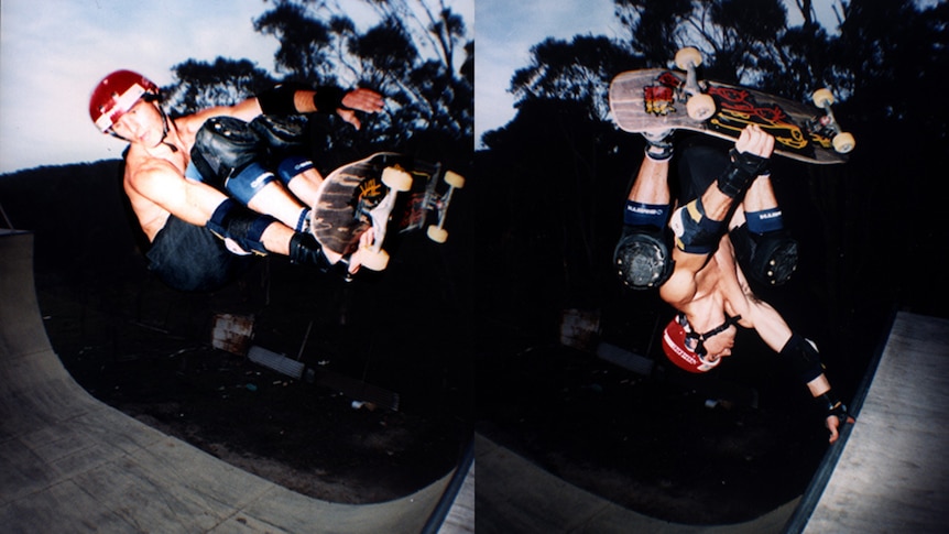 A photo from the 1980's of a man doing tricks on a wooden skate ramp