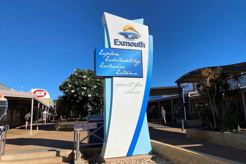 A large sign showing the Exmouth Shire logo, located in the town's centre.