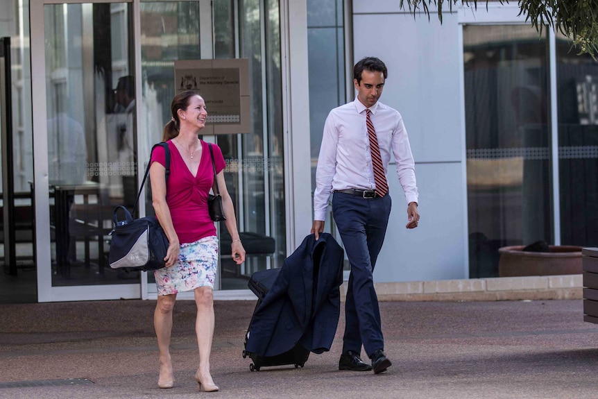 Lawyers walking out of court