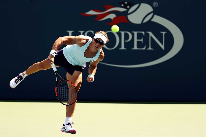 Australia's Samantha Stosur serves to Italy's Camila Giorgi at the 2016 US Open.