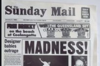 A front page newspaper story showing a man jumping from a roof top.