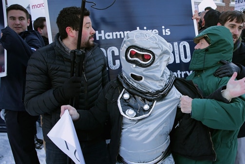 One of the two robot Rubios who followed Marco Rubio around New Hampshire is accosted by Rubio supporters