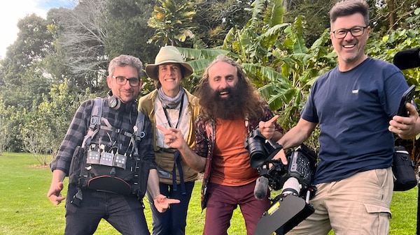 Costa with Gardening Australia production crew in a park.
