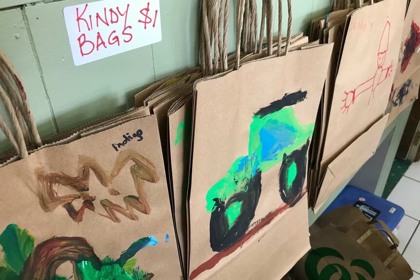 Paper bags painted by small children
