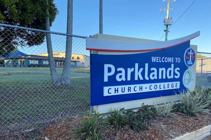 Parklands Christian College school sign on metal gate.