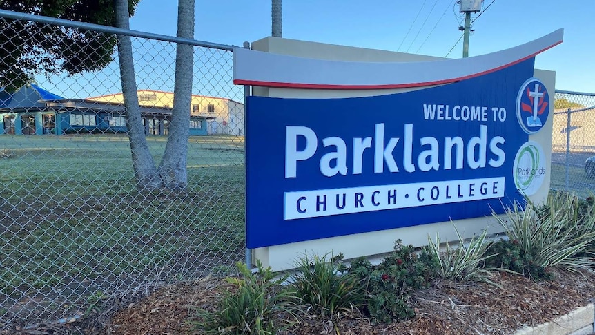 Parklands Christian College school sign on metal gate.